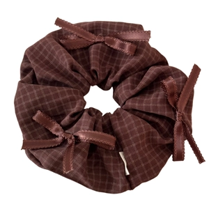 Brown plaid scrunchie with satin bows and checkered fabric texture for women