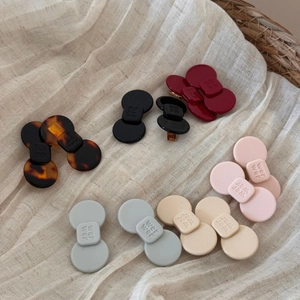 Elegante Acetat-Haarklammern in verschiedenen Farben mit minimalistischem Runddesign