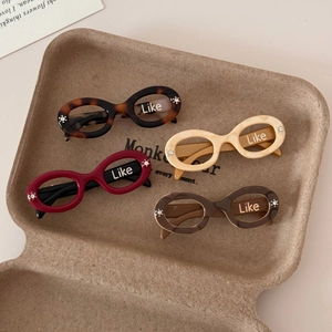 Acetate sunglasses hair clips in tortoiseshell and ivory with rhinestones and Like logo
