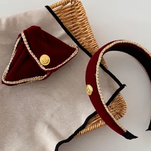 Vintage burgundy velvet headband set with gold woven trim and matching triangle pouch