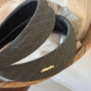 Elegant grey twill sponge headband with Hand Made metal detail and non-slip lining
