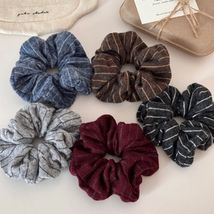 Set of 5 striped knitted scrunchies in navy, brown, grey, red and black for hair styling