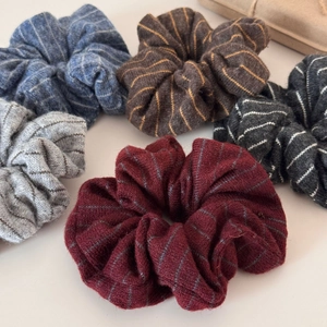 Striped knit scrunchies in various colors like burgundy and navy for women hair styling