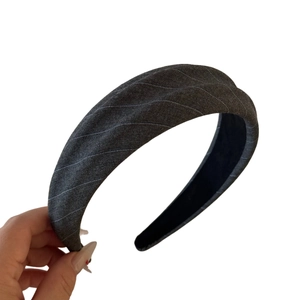 Minimalist wide-brimmed grey striped pleated headband with sponge padding for volume