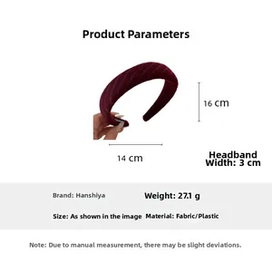 Detail view of burgundy twill knit headband with 16cm height and 14cm width dimensions
