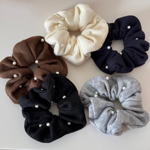 Set of five knitted pearl hair scrunchies in cream, brown, navy, black and grey