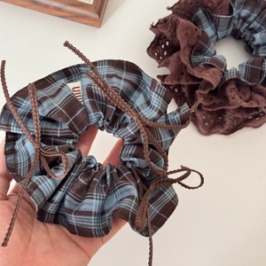 Retro blue and brown plaid scrunchies with lace details and bow in vintage academic style