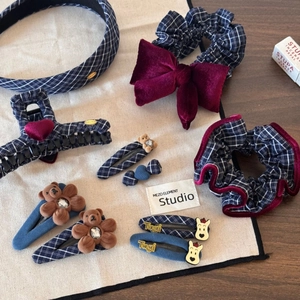 Detailed set of navy plaid hair accessories with velvet teddy bear and stylish hair claws