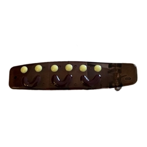 Brown translucent resin hair clip with yellow dots and purple pattern in retro style