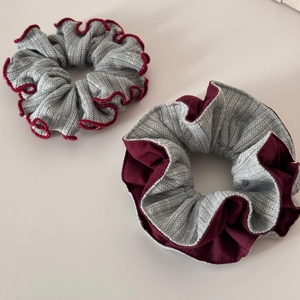 Two-piece set of knitted gray and dark red scrunchies with elegant double-layer design