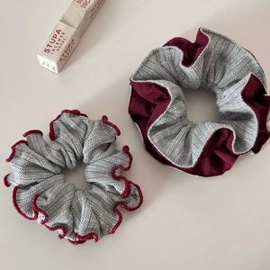 Elegant Korean style grey knit scrunchies with red ruffled edges for casual bun hairstyles
