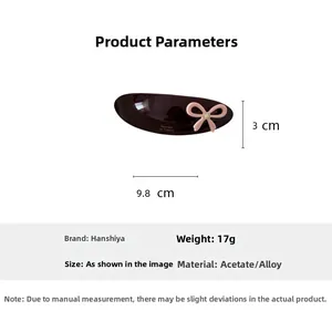 Detail showing dimensions of 9.8cm acetate hair clip with pink bow and pearl accent