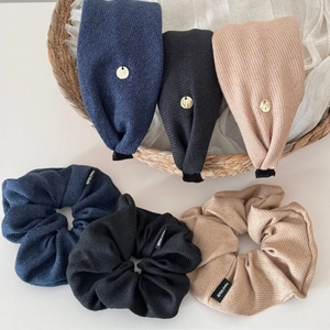 6-piece set of striped fabric hair scrunchies and headbands in navy, black, and khaki