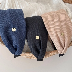 Chic oversized striped fabric scrunchies in navy, black, and beige with gold bow charms