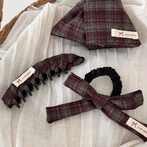 Deep red plaid handmade hair accessory set with bow banana clip on cream textured fabric