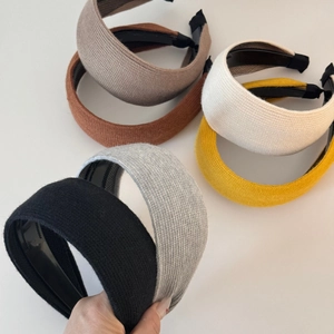Set of wide knitted headbands in six autumn colors with textured fabric and non-slip design
