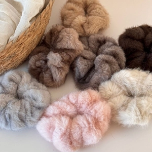 Furry plush scrunchies set in neutral colors for autumn and winter hair styling