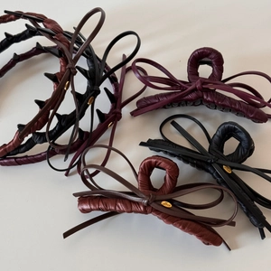 Elegant leather bow hair claw and headband set with gold Love charms in red and black