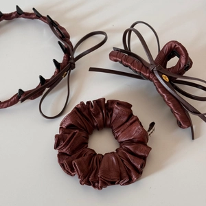Three-piece set featuring dark brown leather hair claw, headband and scrunchie