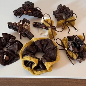 Velvet fabric hair claw clips and scrunchies set with bow details for autumn and winter