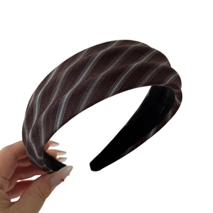 Brown and white diagonal striped wide headband for women in a premium padded design