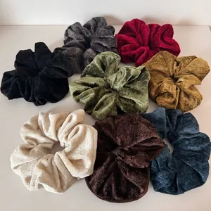 Set of eight oversized velvet hair scrunchies in assorted rich colors for women