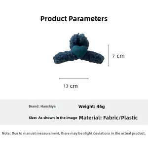 Detail view of 13cm navy blue wool felt heart hair claw with dimensions and weight info