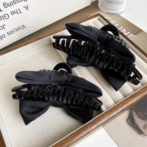 Set of 2 black satin bow hair claws with sequins for elegant updo hairstyles