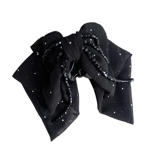 Elegant black chiffon bow hair claw clip with shimmering beads and sparkling glitter finish