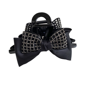 Elegant black bow hair claw clip with silver rhinestones for women's hairstyles