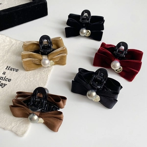 Elegant mini bow hair clips with pearls and vintage charms in various velvet colors