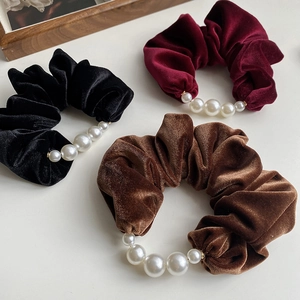 Three-piece velvet hair scrunchie set with white faux pearls in black, red, and brown