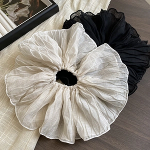 Oversized pleated hair scrunchies set in elegant black and cream white sheer fabric