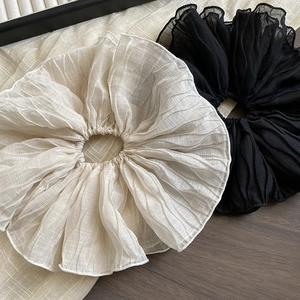 Oversized pleated hair scrunchies in black and cream white with chiffon texture