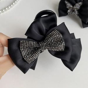 Elegant black satin bow hair claw clip with sparkling rhinestones for women hair styling
