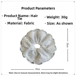 Detailed view of white lace scrunchie with 25cm diameter and 30g lightweight fabric