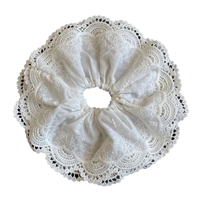 Elegant large white lace scrunchie with floral embroidery and wavy edges for women