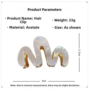 Detail view of 6cm pearlescent white acetate hair claw clip with size measurements