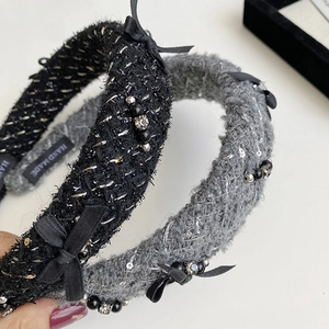 Vintage tweed headband with gold thread and beaded bow accent in black and grey