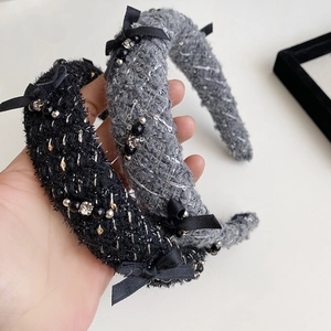 Detail of tweed hairbands with sequins, silk bows, and sparkling beads for women
