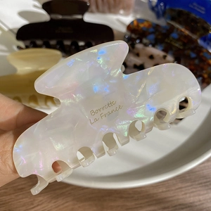 Elegant iridescent acetate hair claw clip for French style updo hairstyles