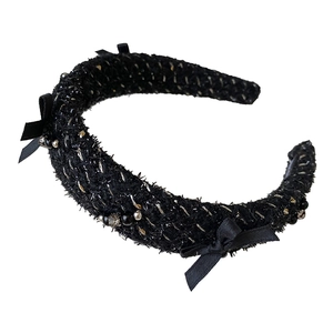 Elegant black tweed headband with gold glitter threads and beaded satin bow decoration