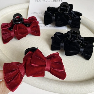 Elegant velvet bow hair claw clips in red and black colors for women's hairstyling