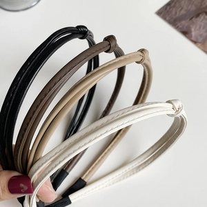 Minimalist knotted leather headbands set in neutral black, coffee, camel and beige colors