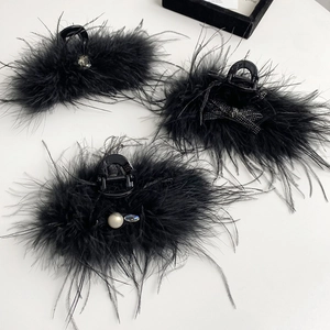 Detail of 13cm black feather hair claws with pearl and rhinestone elegant decorations