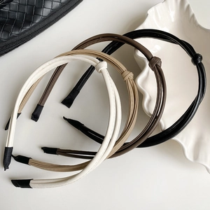 Minimalist knotted leather headbands set in beige, khaki, brown and black colors