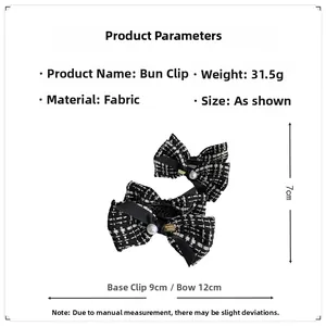 Detail showing checkered bow hair claw clip with pearl accents and 31.5g weight