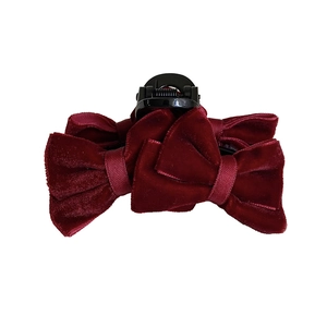Elegant wine red velvet bow hair claw clip for women stylish hair accessory on white base