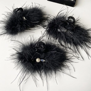 Set of three black feather hair claws with pearls, rhinestones and elegant bows