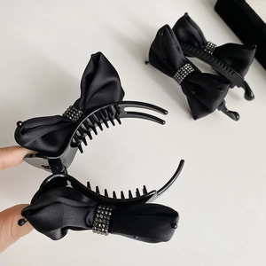 Elegant black satin bow banana hair clip with sparkling rhinestones and secure grip